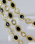 Elegant and festive triple row black and crystal confetti necklace