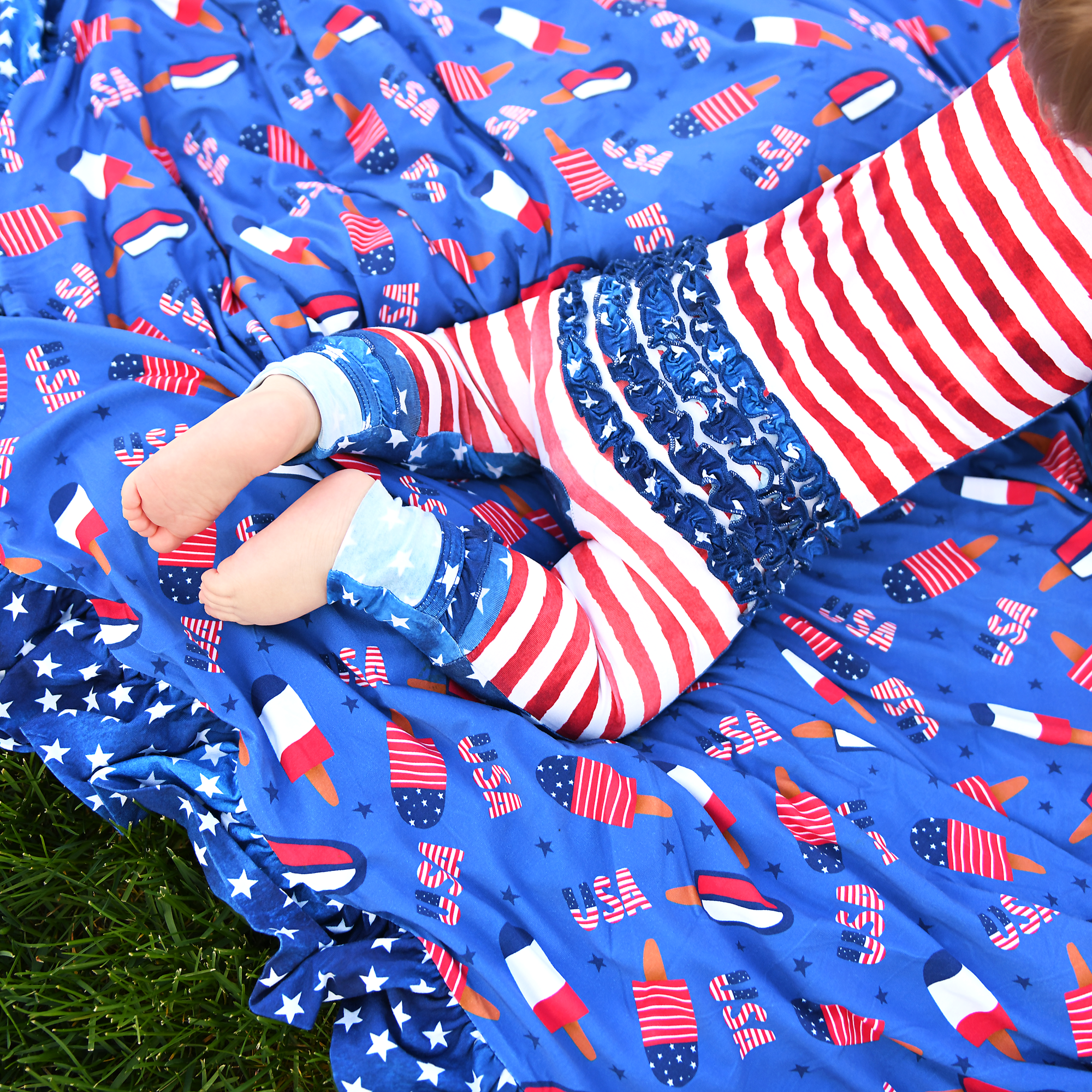 Gigi and Max Stars & Stripes Ruffle Zip Romper