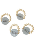 The Strawberry Shop Thanksgiving napkin rings with natural wood beads and distressed metal tags reading thankful words.