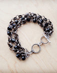 **Black Faceted Triple Strand Beaded Bracelet 807m