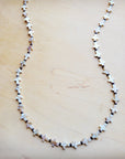 **Long Mother-of-Pearl Cross Necklace 259p