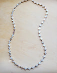 **Long Mother-of-Pearl Cross Necklace 259p