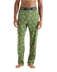 This image features a pair of festive, green pajama pants adorned with a playful reindeer pattern and a holiday-themed waistband. The pants are crafted from a comfortable and stretchable fabric, ensuring both warmth and ease of movement during wear.