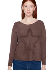 The Strawberry Shop chocolate brown knit sweater featuring a textured star design with fringe detail on a model.