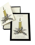 The Strawberry Shop s.e.hagarman ivory Christmas stationery set with candle and holly illustration in a black gift box