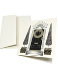 The Strawberry Shop s.e.hagarman ivory Christmas greeting card with a festive entryway illustration and crystals.