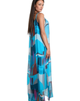 The Strawberry Shop Marla silk maxi dress in a blue retro geometric print with spaghetti straps and side slits