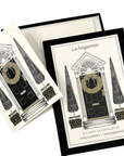 The Strawberry Shop s.e.hagarman Christmas entryway stationery set with ivory cards, glitter, and crystal accents.