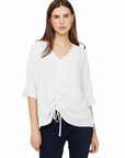 The Strawberry Shop CompliK Top 36050, a lavender ruched V-neck blouse with drawstring detail and 3/4 sleeves.