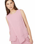 The Strawberry Shop pink gauze sleeveless top with two front pockets and a relaxed fit.
