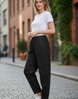 The Strawberry Shop Citron Bleu black barrel leg lightweight pants with elastic waist and contrast stitching.
