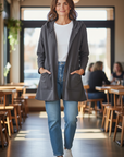 The Strawberry Shop grey cotton hooded jacket with brown buttons, large front pockets, and high-low hem.