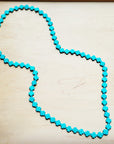 **Long Turquoise Beaded Cross Necklace 258L