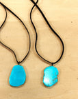 **Turquoise Slab Pendant on Leather Cord Necklace 254d