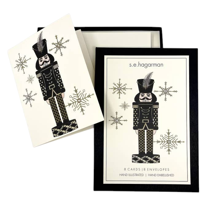 The Strawberry Shop s.e.hagarman nutcracker stationery set with crystal and glitter embellished ivory holiday cards.