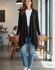 The Strawberry Shop black viscose-spandex blend open front long sleeve cardigan with a high-low tapered hem.