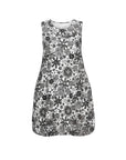 The Strawberry Shop sleeveless black and white floral print rayon-blend dress with pockets and elastic hem.