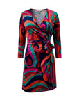 The Strawberry Shop La Mer Luxe wrap dress with 3/4 sleeves, V-neck, and tie waist in a navy, aquamarine, pink, and orange swirl print. Made of polyester and spandex.