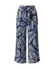 The Strawberry Shop La Mer Luxe navy and white palm print knit wrap front pants, made of polyester and spandex.