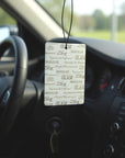 The Strawberry Shop Tyler Candle High Maintenance car air freshener, floral and woody scent with vanilla and musk.
