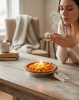 The Strawberry Shop apple pie candle with realistic sliced apples and cinnamon topping in a foil pie tin.
