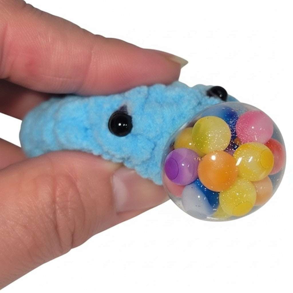 The Strawberry Shop blue crochet blob keychain with a squeezable sensory stress ball fidget toy inside.
