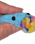 The Strawberry Shop blue crochet blob keychain with a squeezable sensory stress ball fidget toy inside.