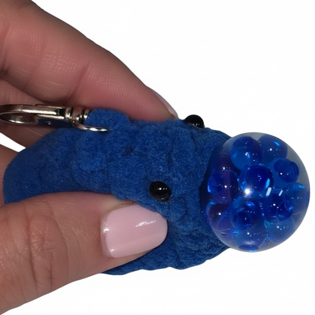 The Strawberry Shop blue crochet smiley face stress ball keychain with water beads and silver lobster clasp