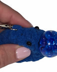 The Strawberry Shop blue crochet smiley face stress ball keychain with water beads and silver lobster clasp