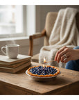 The Strawberry Shop blueberry pie candle with realistic blueberries and pie crust.