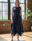 The Strawberry Shop dark denim stretch dress with tulip ruffles, zip back, hidden pockets, and frayed hem.