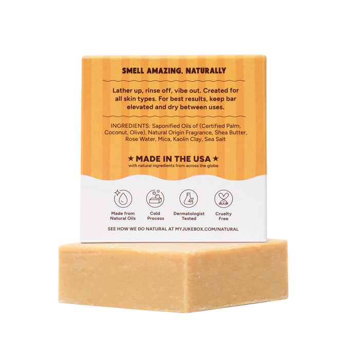 The Strawberry Shop Dr. Squatch Be Our Bubbles soap bar with its orange and white product packaging box on top.