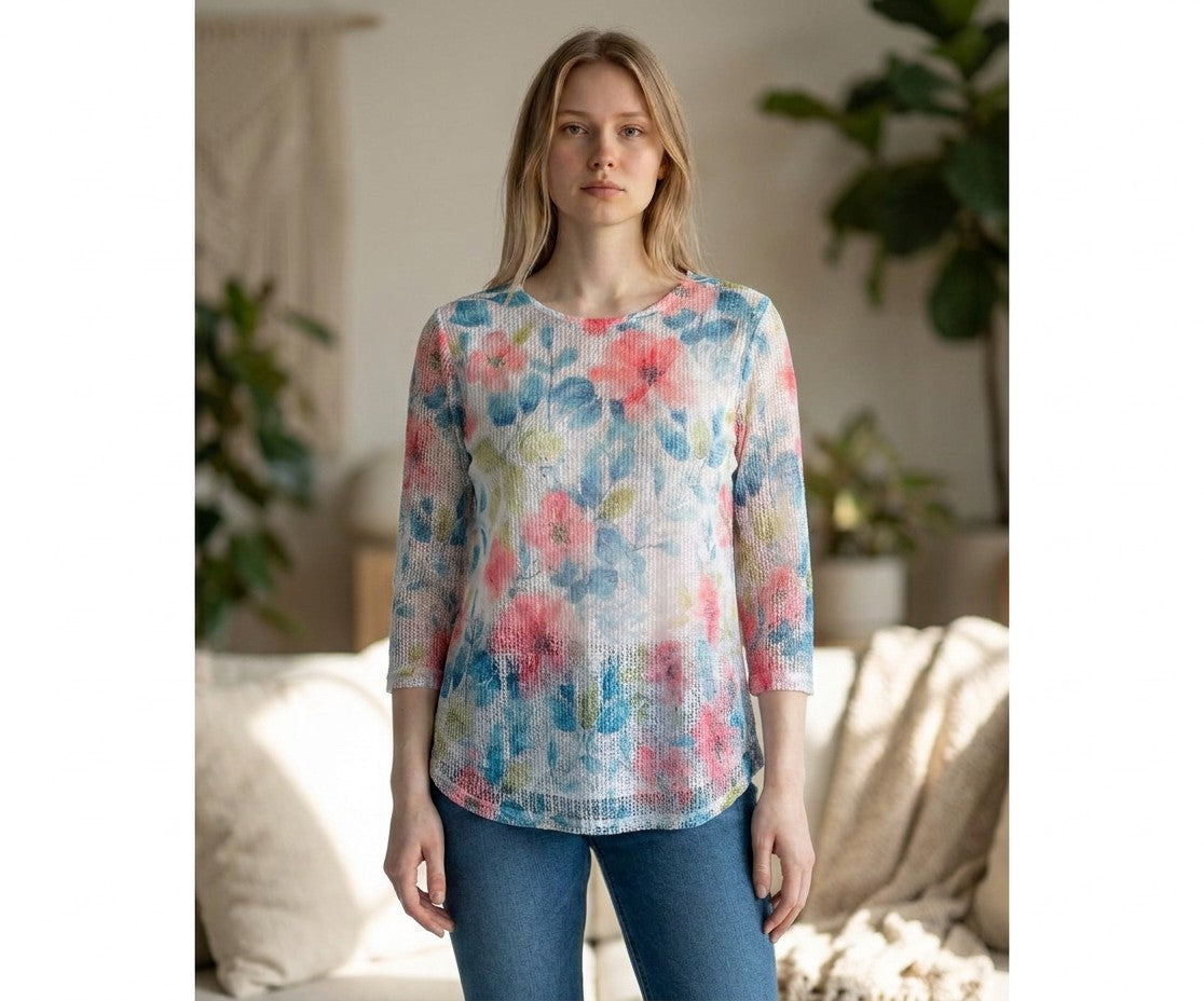 The Strawberry Shop floral openwork knit top with 3/4 mesh sleeves in pink, blue, and green on a model.