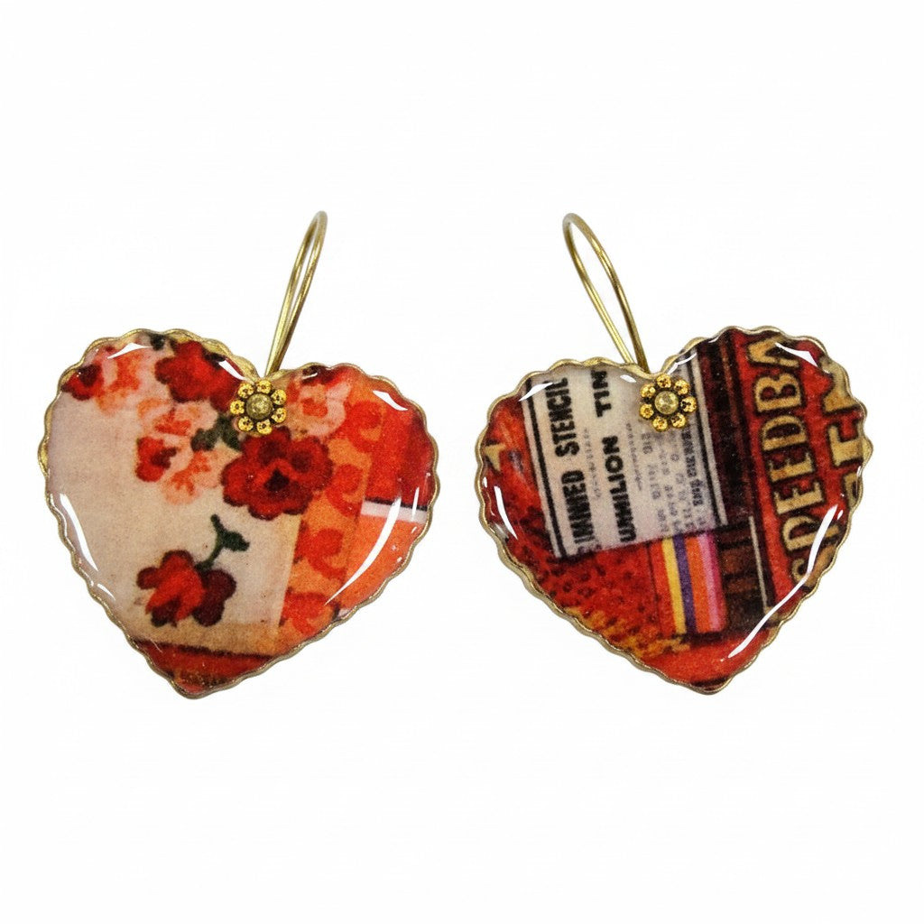 The Strawberry Shop heart-shaped dangle earrings with floral and collage designs, gold-tone hardware, and flower accents.