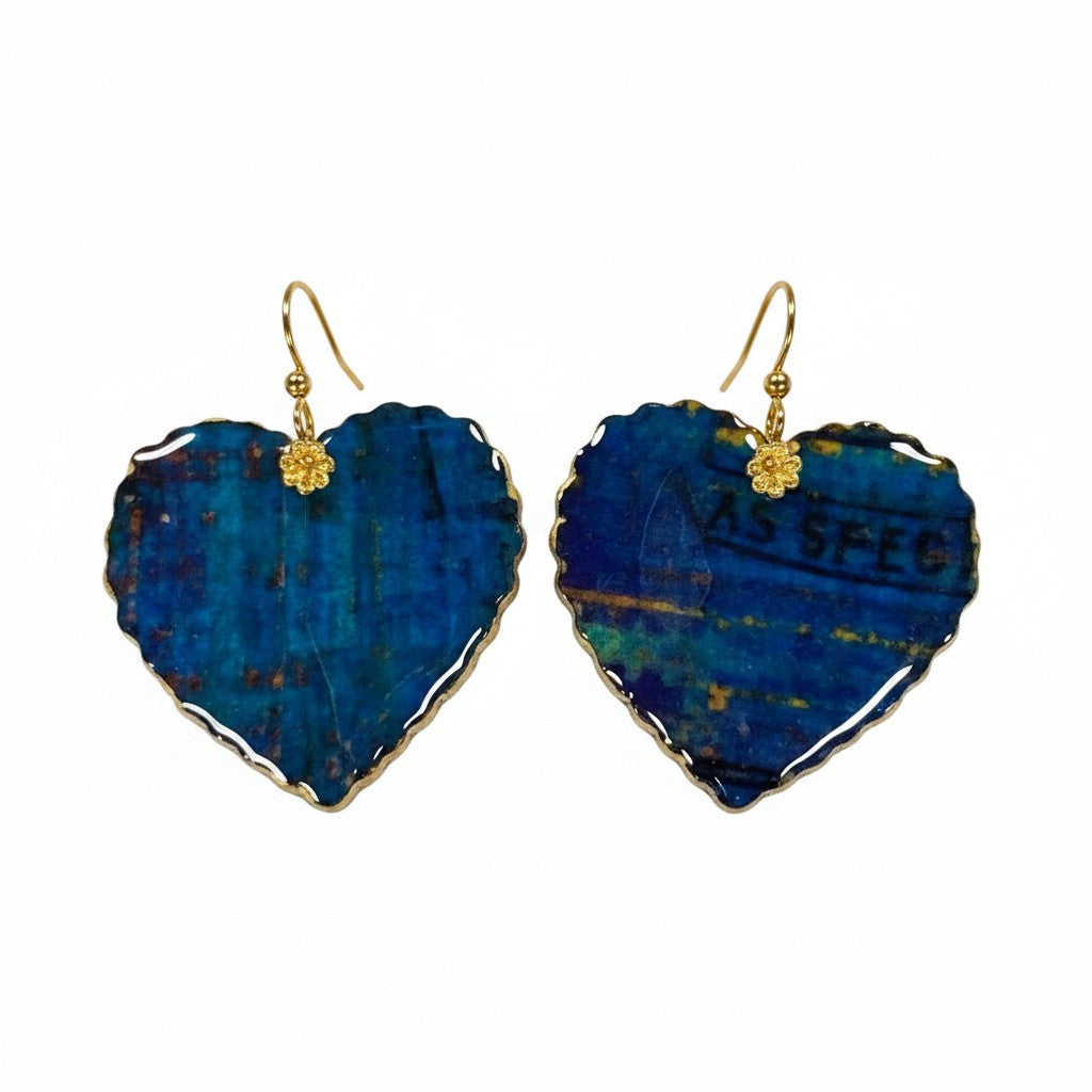The Strawberry Shop heart-shaped drop earrings in teal and blue resin with gold tone edge and dangle hooks.