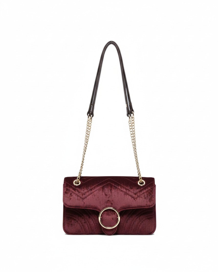 The Strawberry Shop JEN &amp; CO. merlot quilted velvet crossbody bag with an adjustable gold chain strap and snap closure