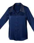 The Strawberry Shop navy blue satin blouse with rhinestone collar and button front. Long sleeves with wide cuffs.