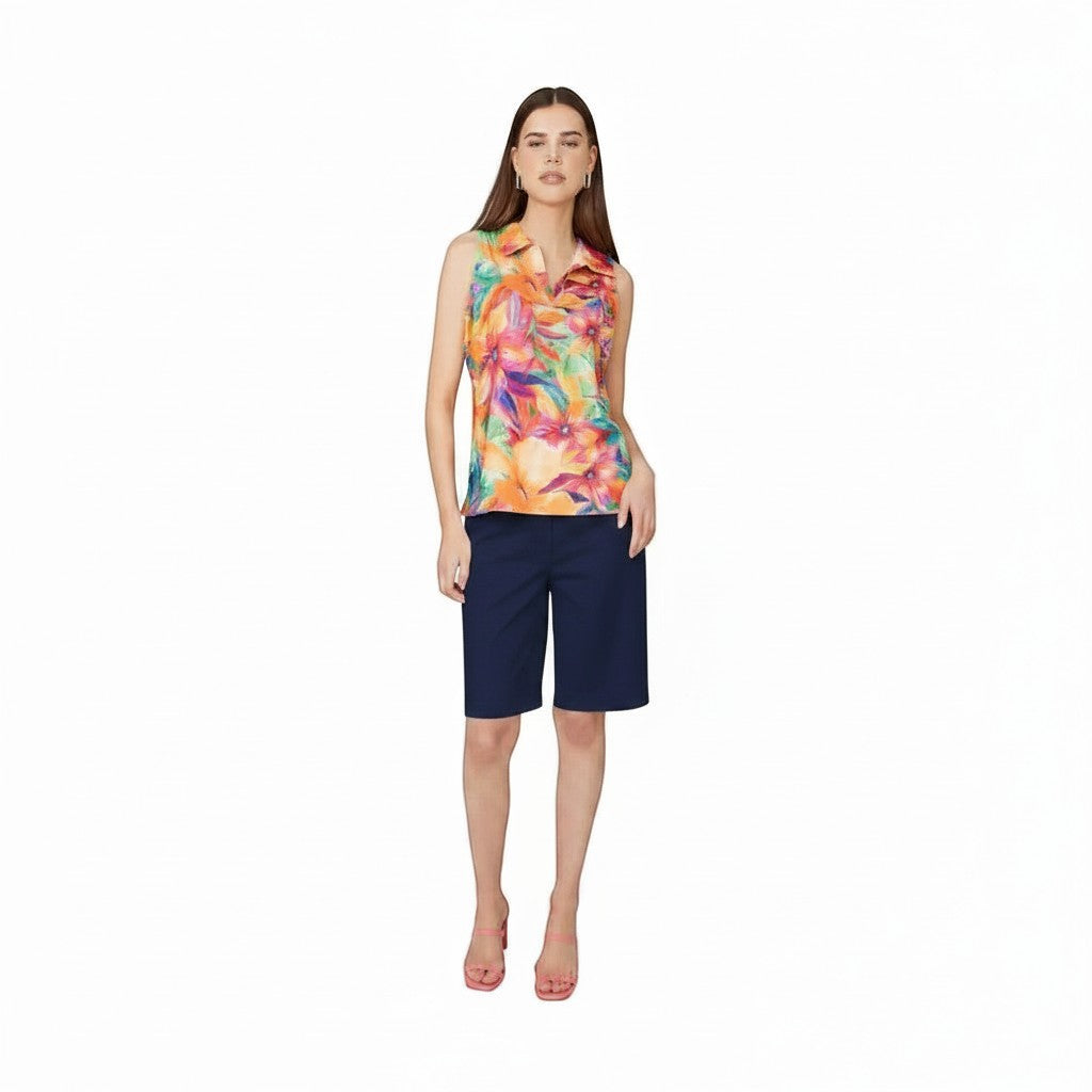 The Strawberry Shop white knee-length Bermuda shorts with side pockets and a relaxed fit. Made from rayon, nylon, and spandex.