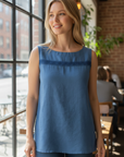 The Strawberry Shop blue linen tank top with embroidered detail and A-line cut.