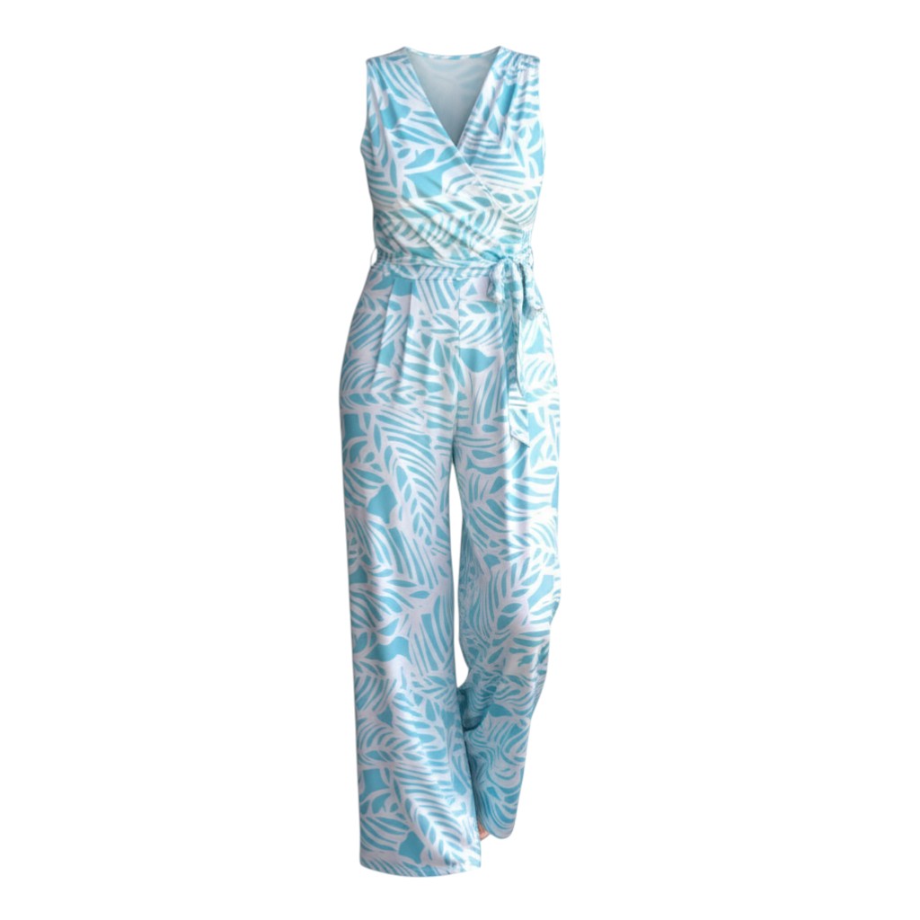The Strawberry Shop La Mer Luxe Winifred jumpsuit in Caribbean blue with a tropical leaf print. Sleeveless, wrap-front design with a tie waist.