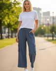 The Strawberry Shop Citron Bleu lightweight blue pinstripe cropped pants with side pockets.