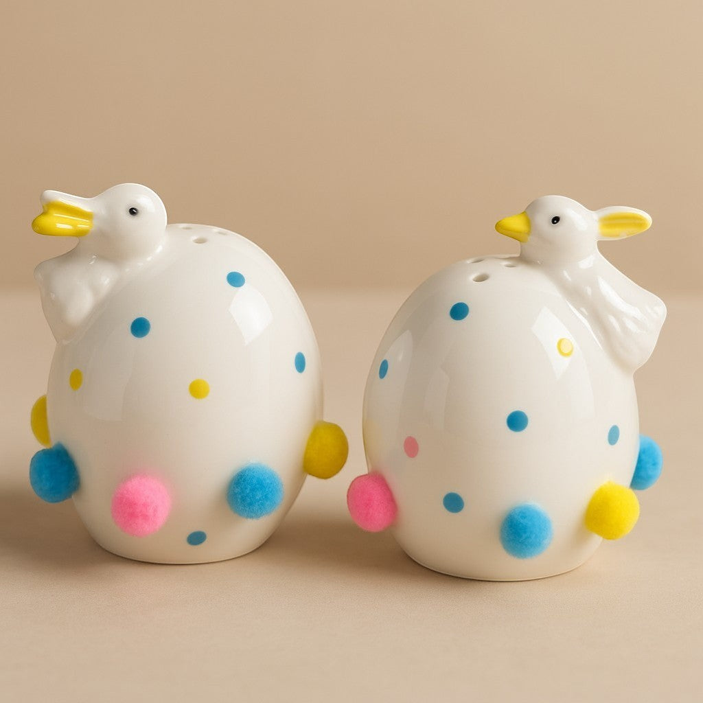 The Strawberry Shop Easter egg-shaped salt and pepper shakers with ducklings, polka dots, and pom-poms.