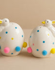 The Strawberry Shop Easter egg-shaped salt and pepper shakers with ducklings, polka dots, and pom-poms.