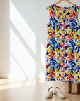 The Strawberry Shop Foil Sun-Sational sleeveless linen dress with a vibrant multicoloured leaf print and knee-length silhouette.