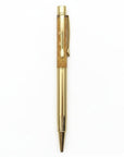 The Strawberry Shop Snifty Glitter Pen, gold metal barrel with a clear grip filled with gold glitter.