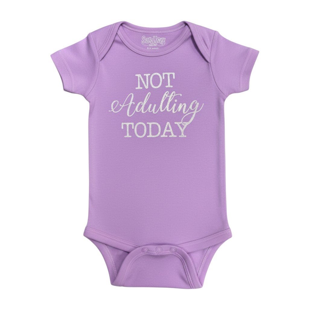 The Strawberry Shop lavender 100% cotton baby onesie with silver 'Not Adulting Today' script. Fits up to 13 lbs.