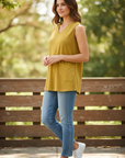 The Strawberry Shop mustard yellow sleeveless cotton V-neck tank top with a side pocket. 96% Cotton, 4% Spandex.