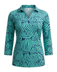 The Strawberry Shop navy and aquamarine abstract print 3/4 sleeve tunic top made of polyester and spandex.