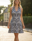 The Strawberry Shop navy and white sleeveless knit Barbara dress with collar and fun hem. 90% Polyester, 10% Spandex.