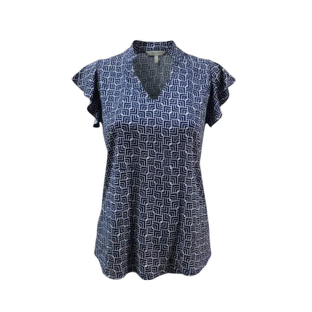The Strawberry Shop navy and white geometric print knit short sleeve Sevilla top with V-neck and flutter sleeves.